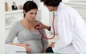 женщина беременна у врача